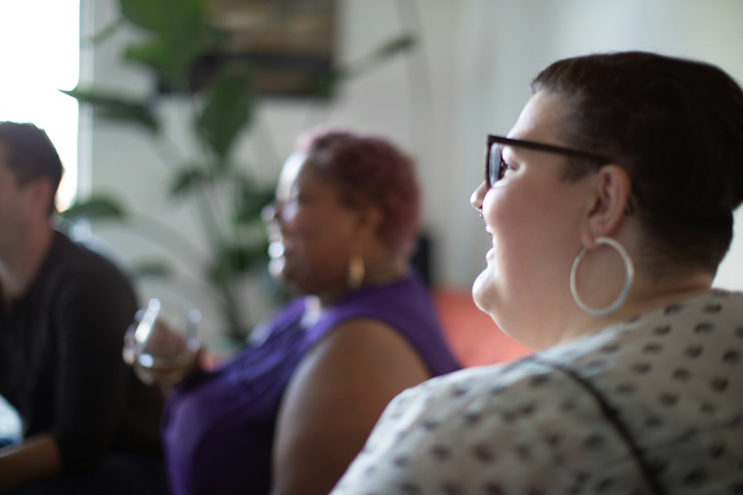 Woman engaged with a group of people